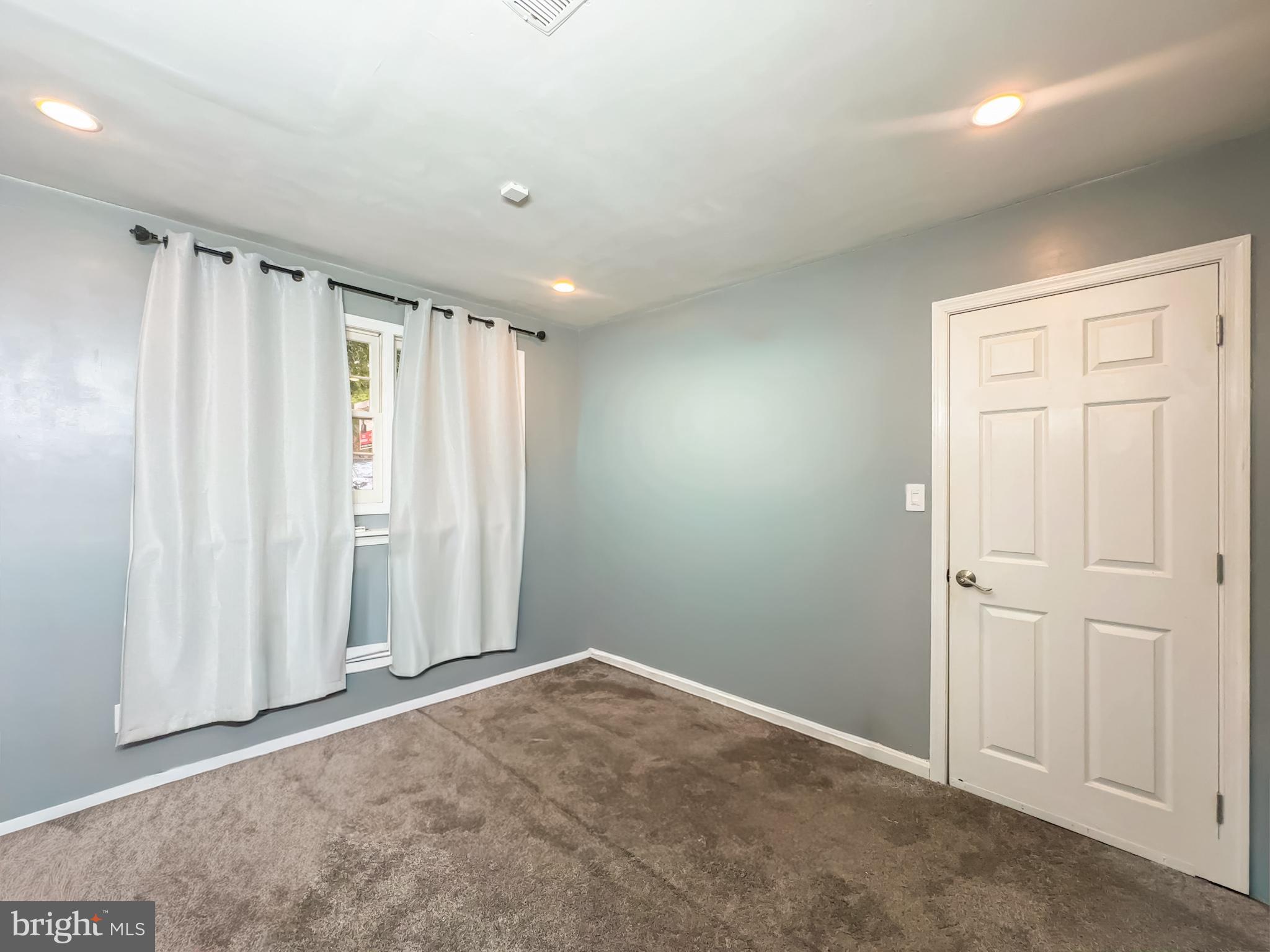 2863 Strauss Terrace Silver Spring, MD 20904 - Photo 7 of 23 an empty room with windows