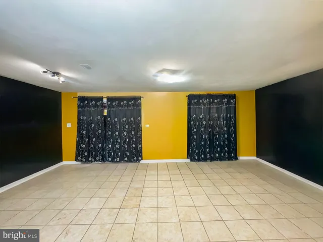 a view of entryway with wooden walls