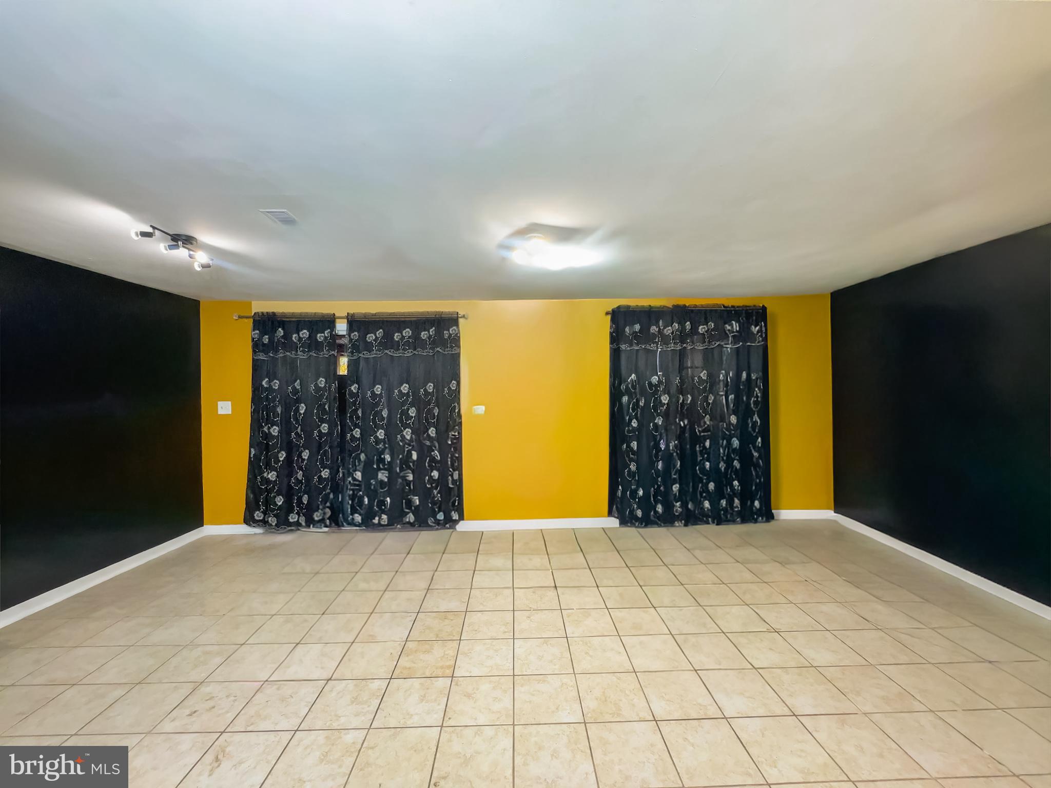 2863 Strauss Terrace Silver Spring, MD 20904 - Photo 10 of 23 a view of an empty room with a fireplace