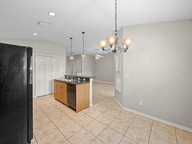 a view of a ceiling fan in a room