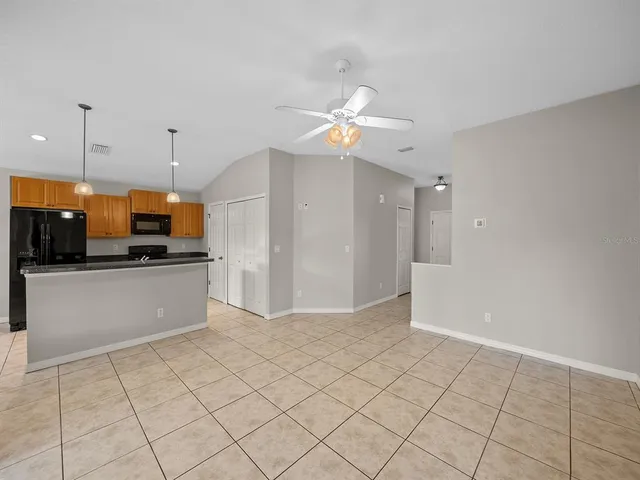a view of kitchen and with wooden floor