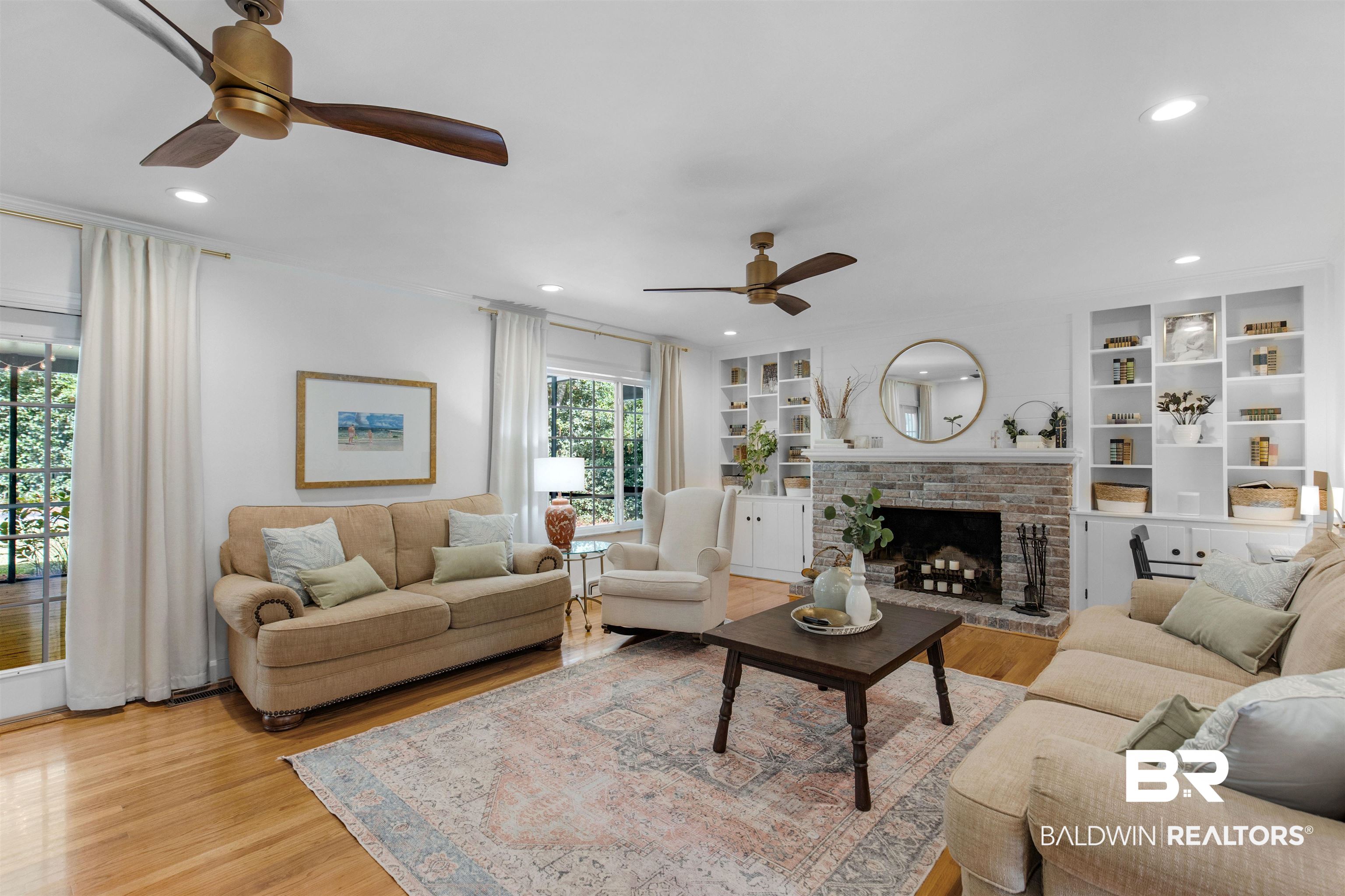 4306 Michael Boulevard Mobile, AL 36609 - Photo 8 of 35 Living room featuring light hardwood / wood-style floors, a fireplace, and ceiling fan