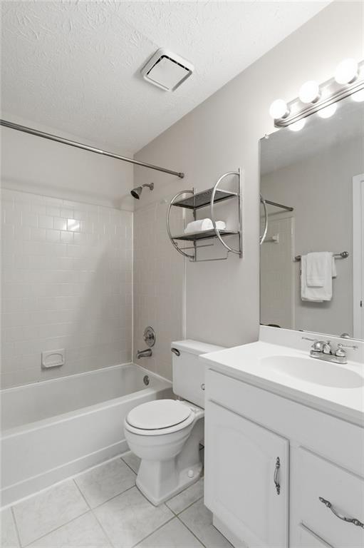809 Wedgewood Way Atlanta, GA 30350 - Photo 16 of 27 a bathroom with a toilet a sink a mirror and bathtub