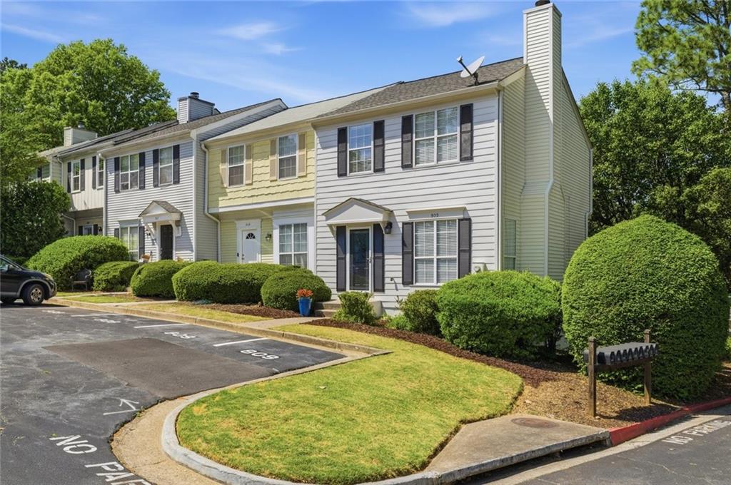 809 Wedgewood Way Atlanta, GA 30350 - Photo 27 of 27 front view of a house with a yard