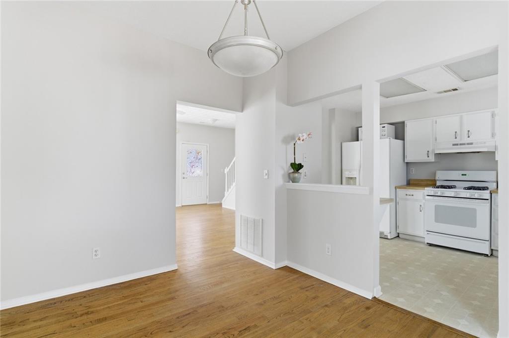 809 Wedgewood Way Atlanta, GA 30350 - Photo 5 of 27 a view of kitchen and wooden floor