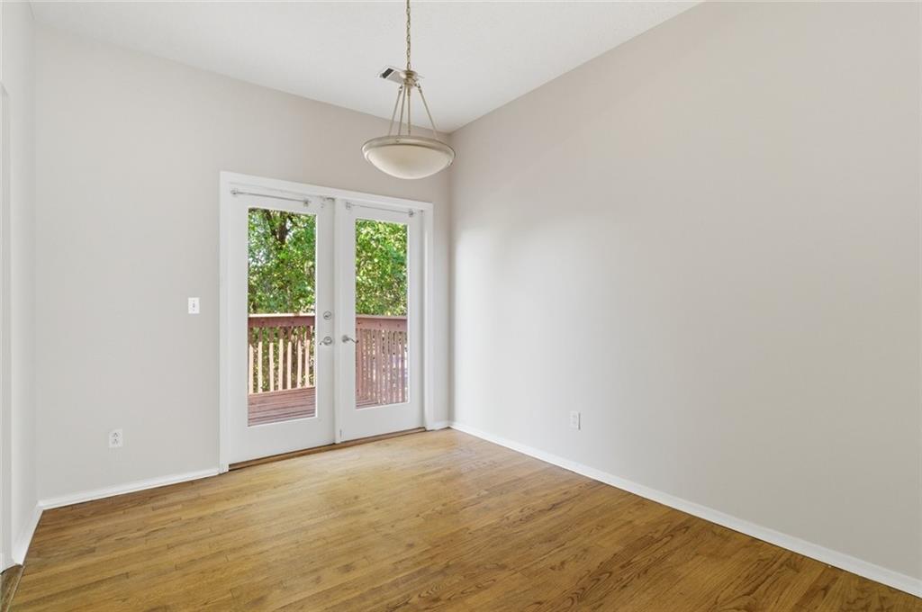 809 Wedgewood Way Atlanta, GA 30350 - Photo 6 of 27 a view of an empty room with a window