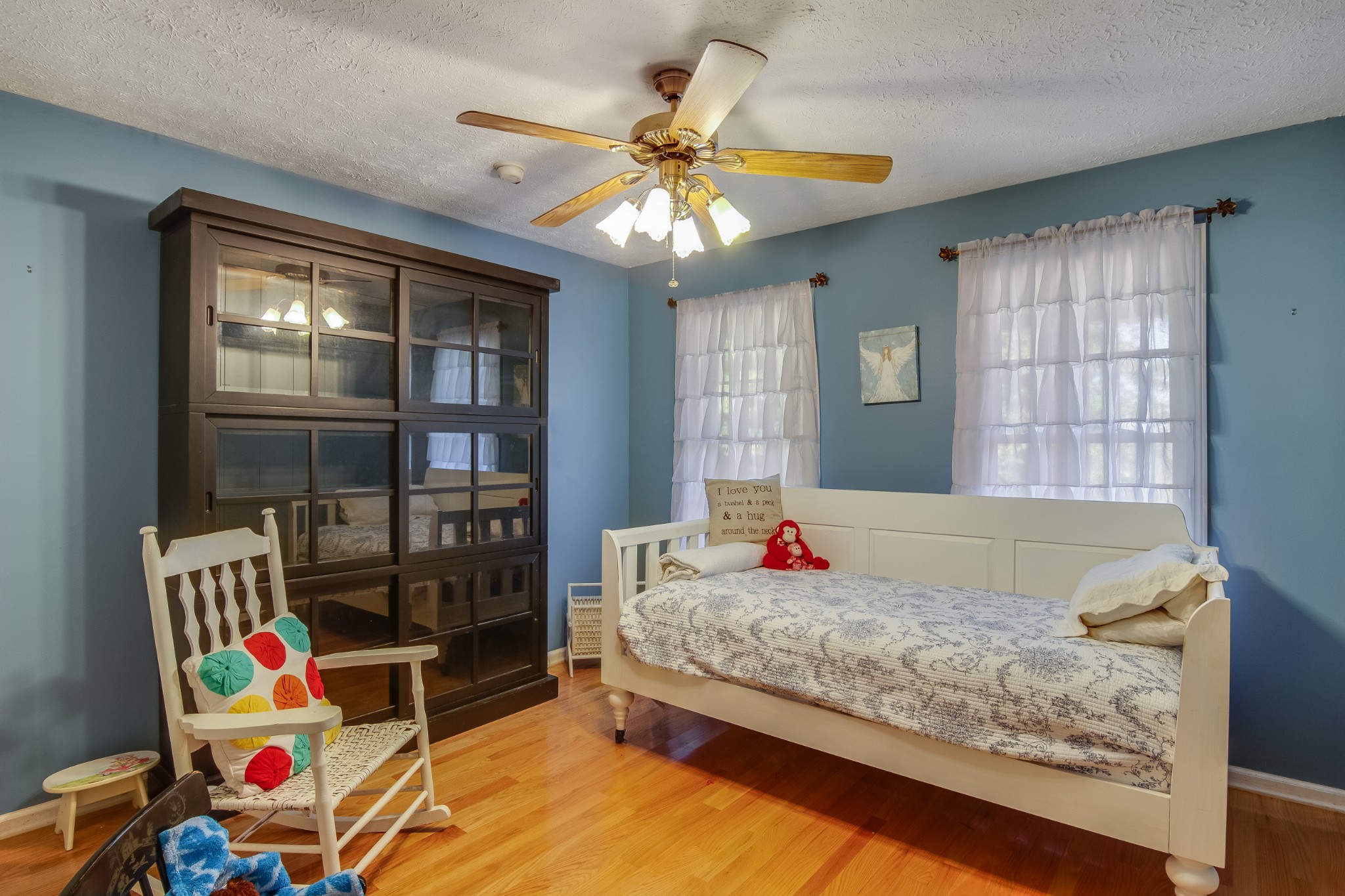 2963 Cole Ridge Road Beechgrove, TN 37018 - Photo 14 of 26 a bedroom with a bed and a chandelier