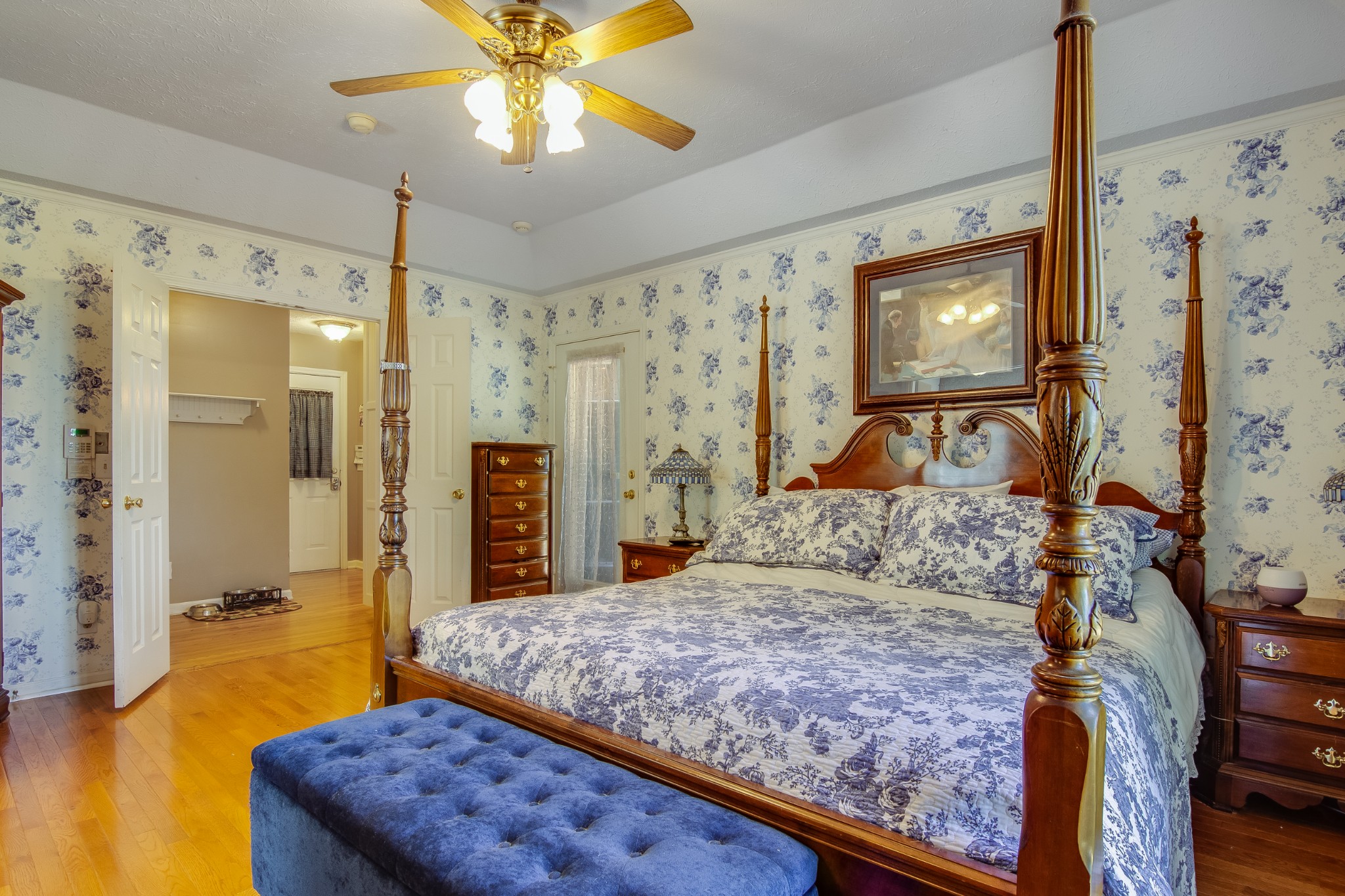 2963 Cole Ridge Road Beechgrove, TN 37018 - Photo 16 of 26 a bedroom with a bed and a chandelier