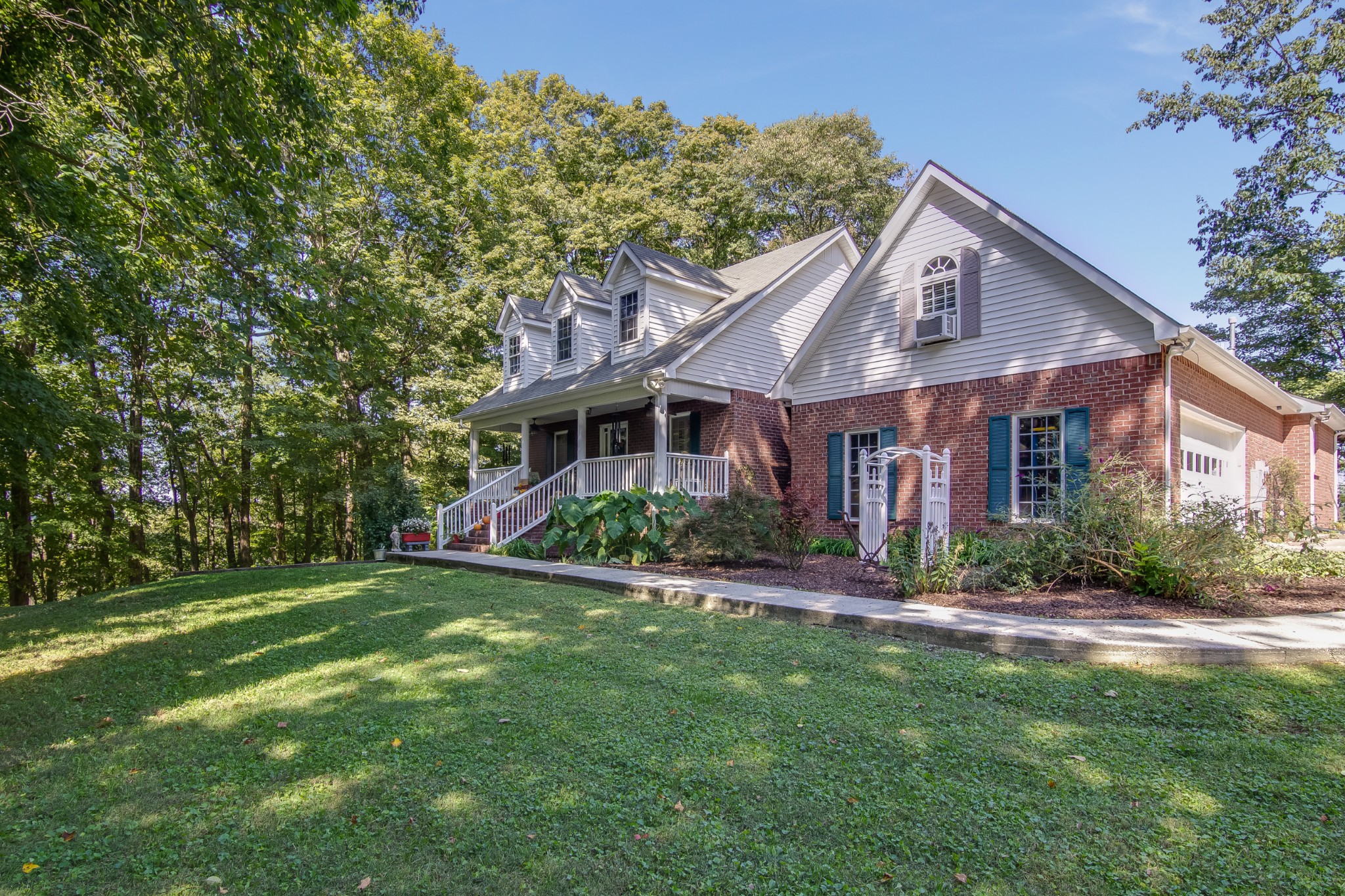2963 Cole Ridge Road Beechgrove, TN 37018 - Photo 2 of 26 a front view of a house with a yard
