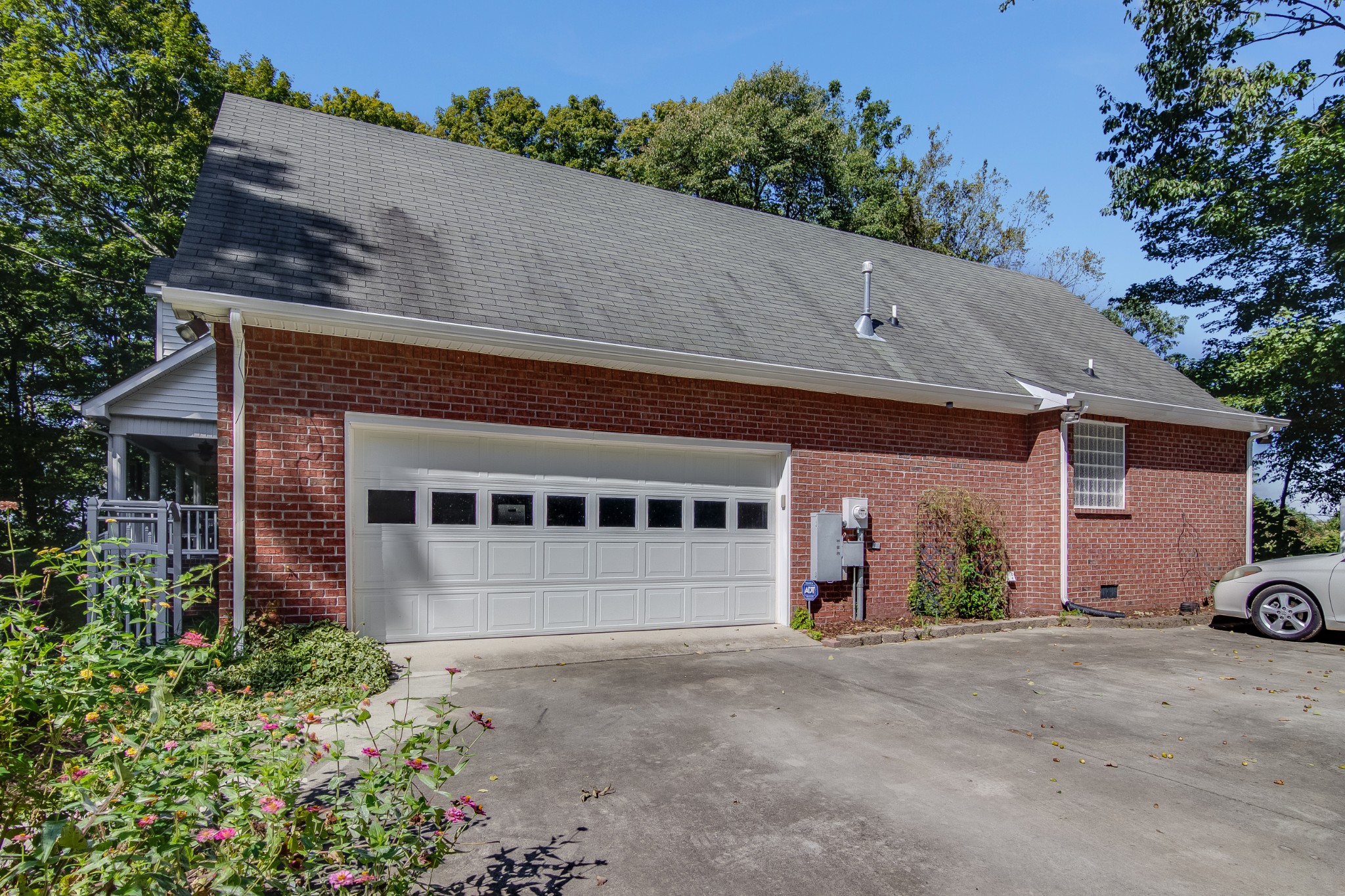 2963 Cole Ridge Road Beechgrove, TN 37018 - Photo 22 of 26 a front view of a house with a yard and garage