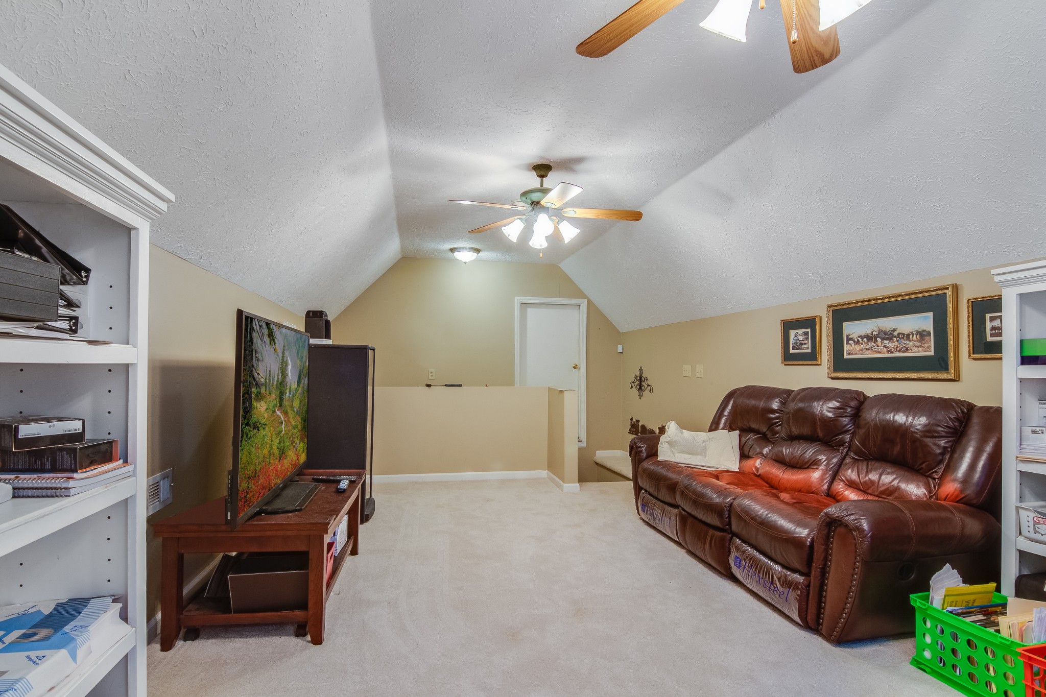 2963 Cole Ridge Road Beechgrove, TN 37018 - Photo 23 of 26 a living room with furniture and a flat screen tv