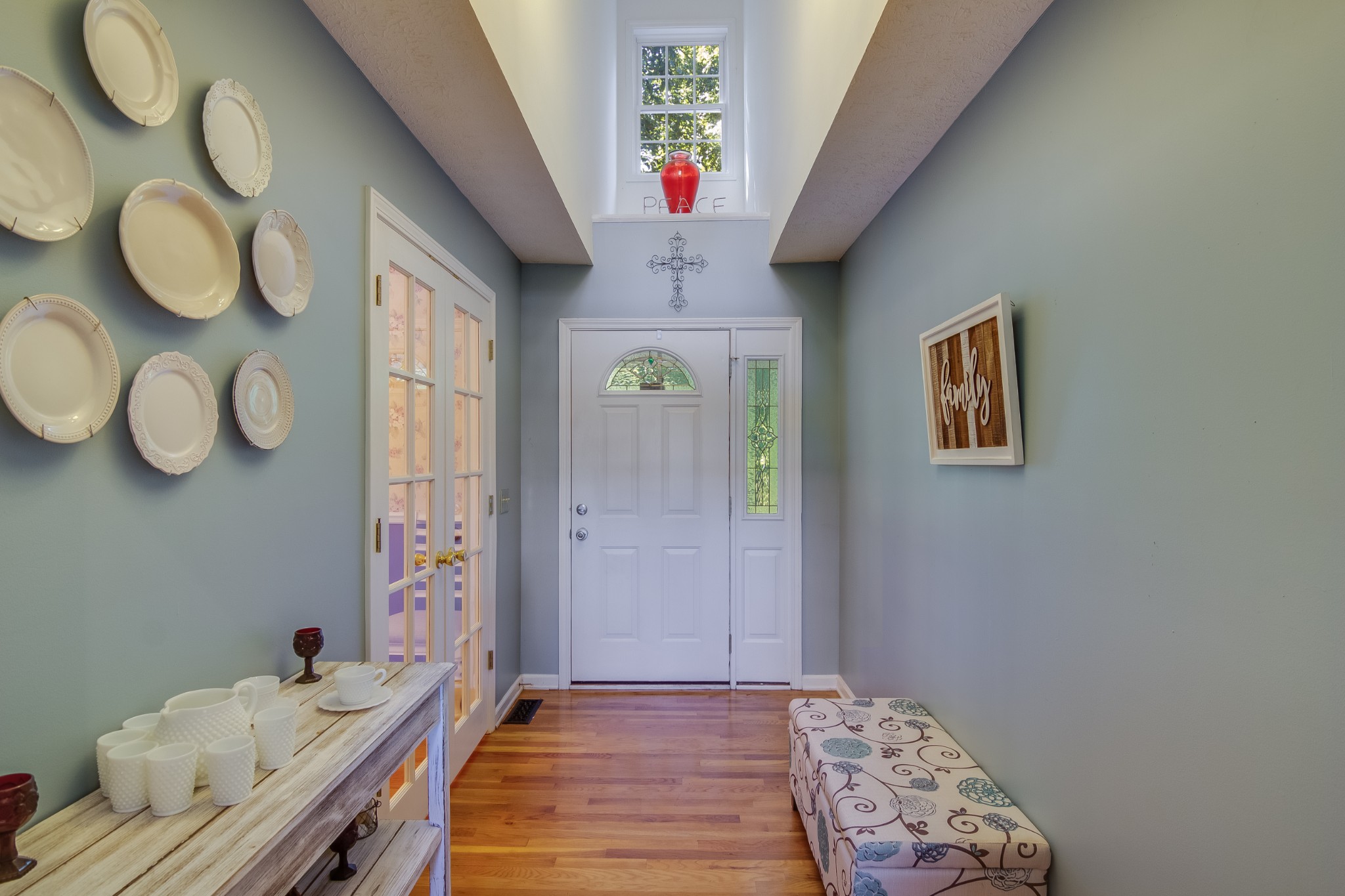 2963 Cole Ridge Road Beechgrove, TN 37018 - Photo 3 of 26 a bedroom with a bed and a chandelier