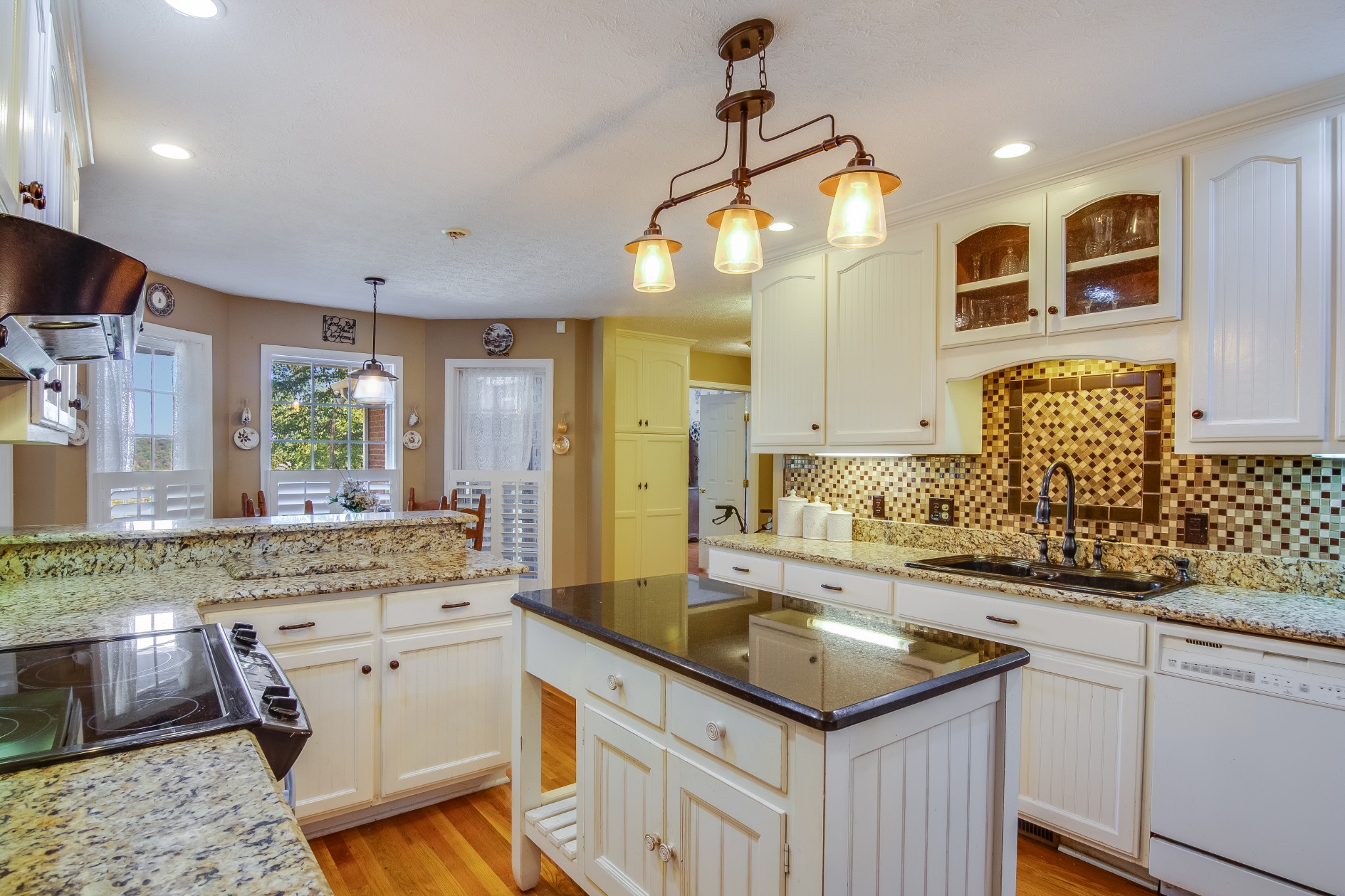 2963 Cole Ridge Road Beechgrove, TN 37018 - Photo 8 of 26 a kitchen with a sink stove and microwave