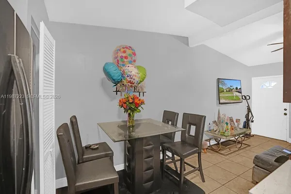 a view of a dining room with furniture