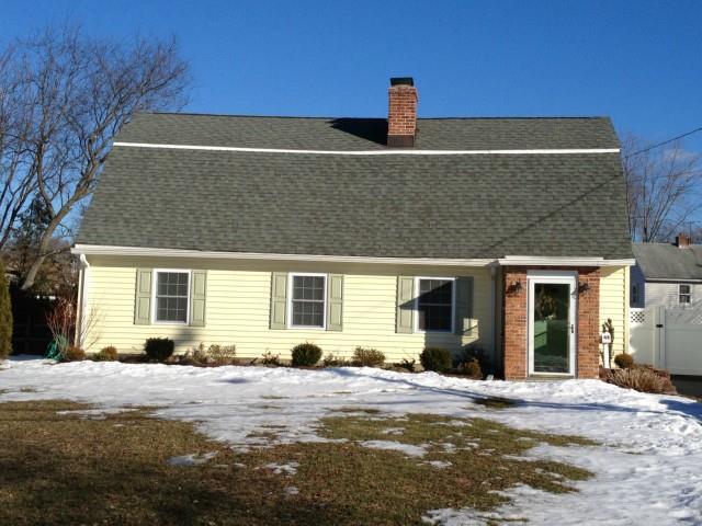 46 Shadow Ridge Road Stamford, CT 06905 - Photo 1 of 1 a front view of a house with a yard