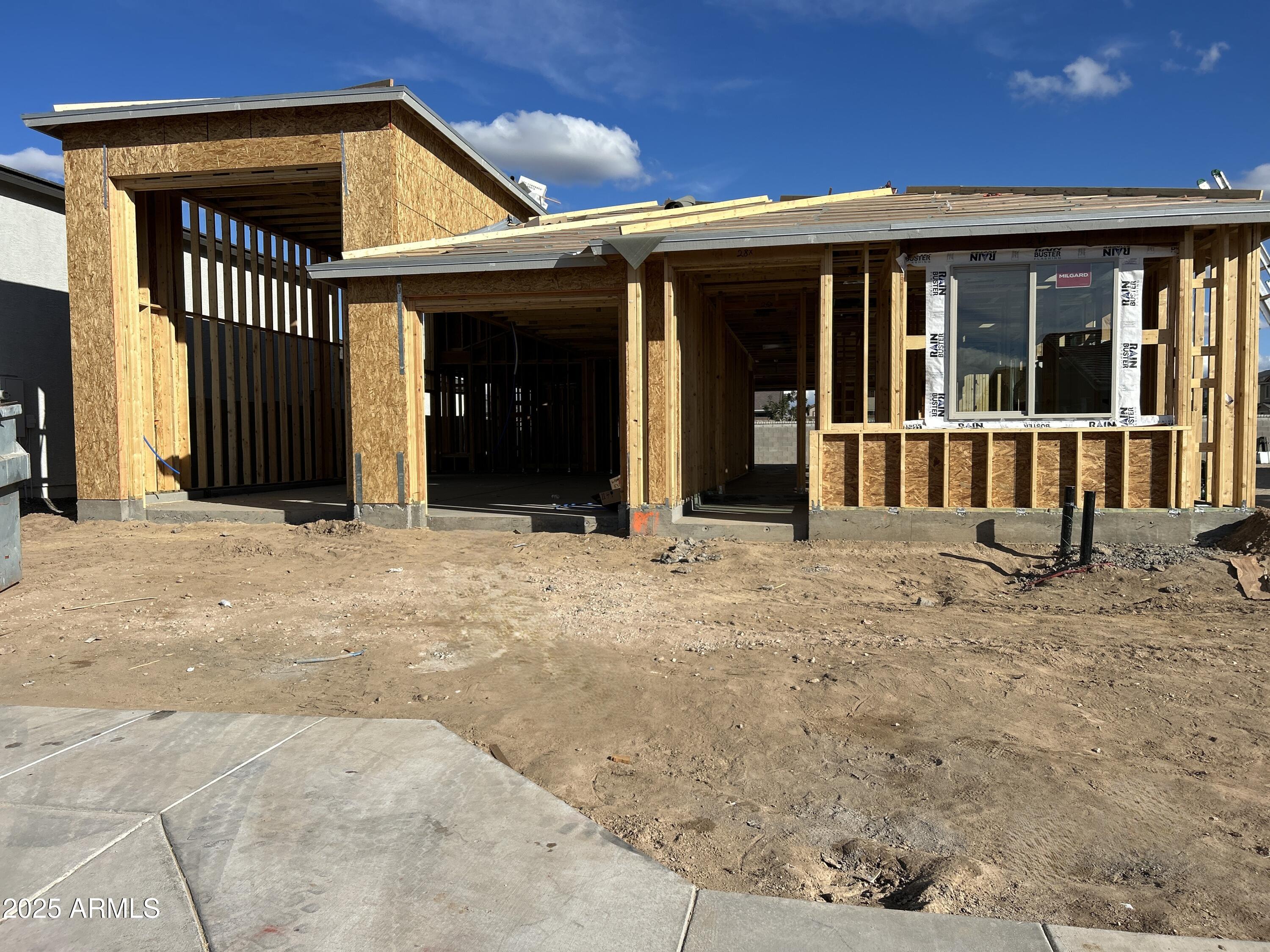 32057 Lone Rancher Way San Tan Valley, AZ 85140 - Photo 2 of 36 a view of a entryway door of the house