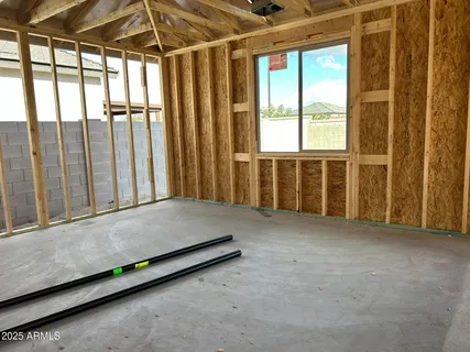 a view of a bathroom with a tub and a window