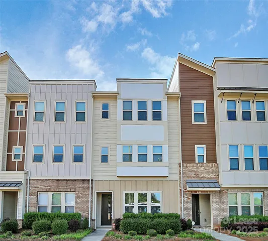 a front view of a building with windows
