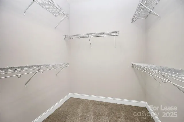 a view of small space with racks on the wall