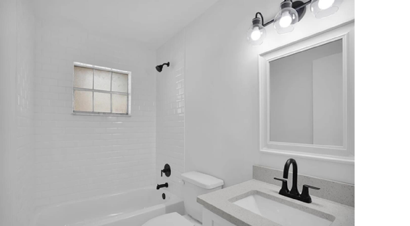 1010 San Remo Road St. Augustine, FL 32086 - Photo 14 of 67 a bathroom with a sink and a bathtub