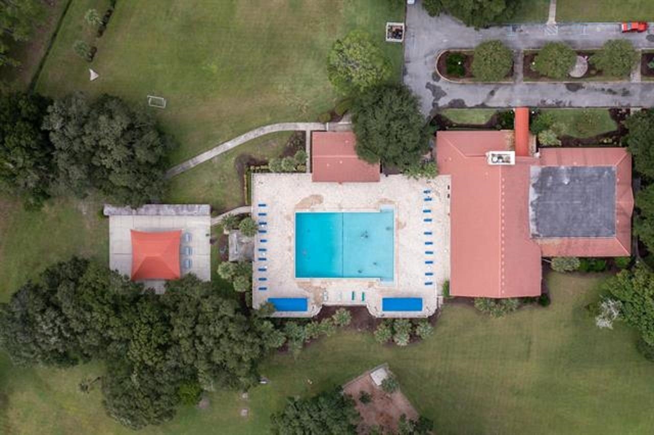1010 San Remo Road St. Augustine, FL 32086 - Photo 36 of 67 an aerial view of a house with a yard