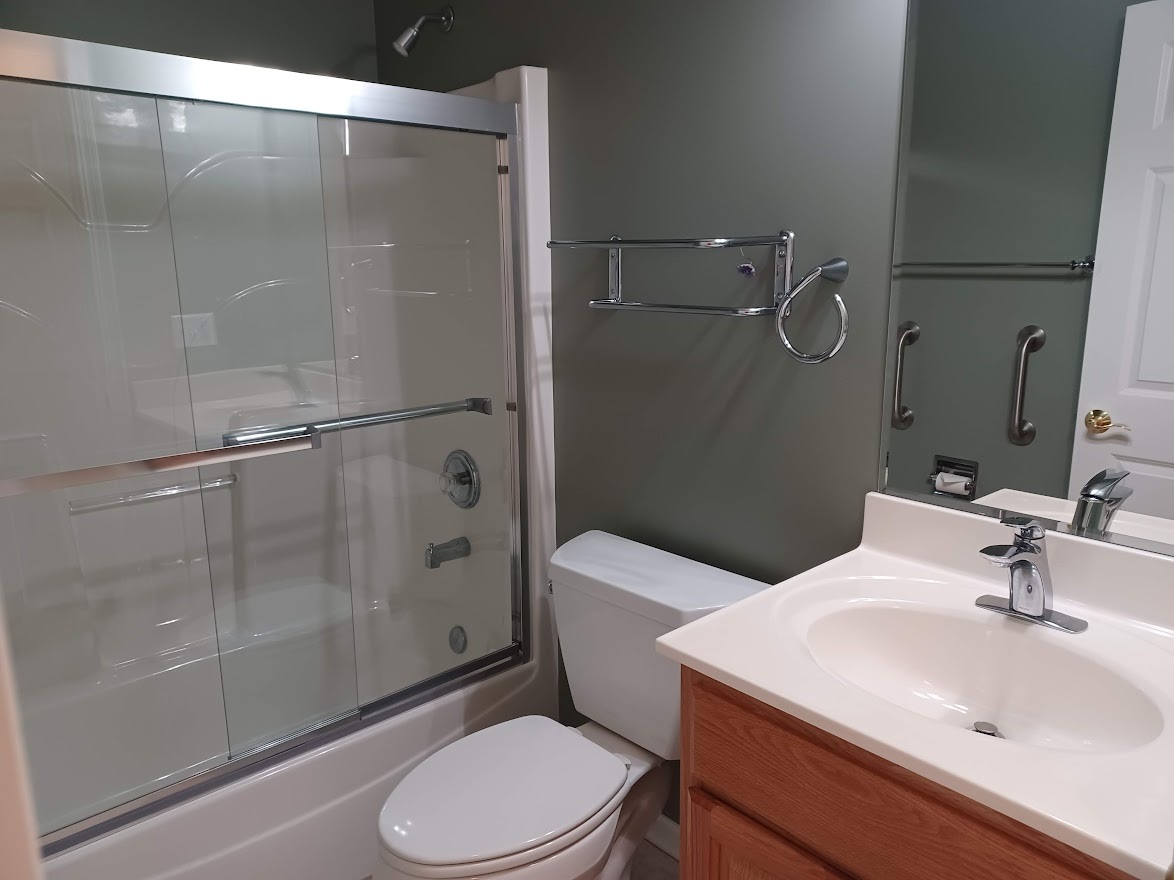 24463 Tufton Street Plainfield, IL 60585 - Photo 14 of 29 a bathroom with a sink toilet and shower