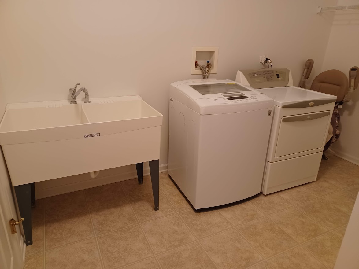 24463 Tufton Street Plainfield, IL 60585 - Photo 19 of 29 a utility room with dryer and washer