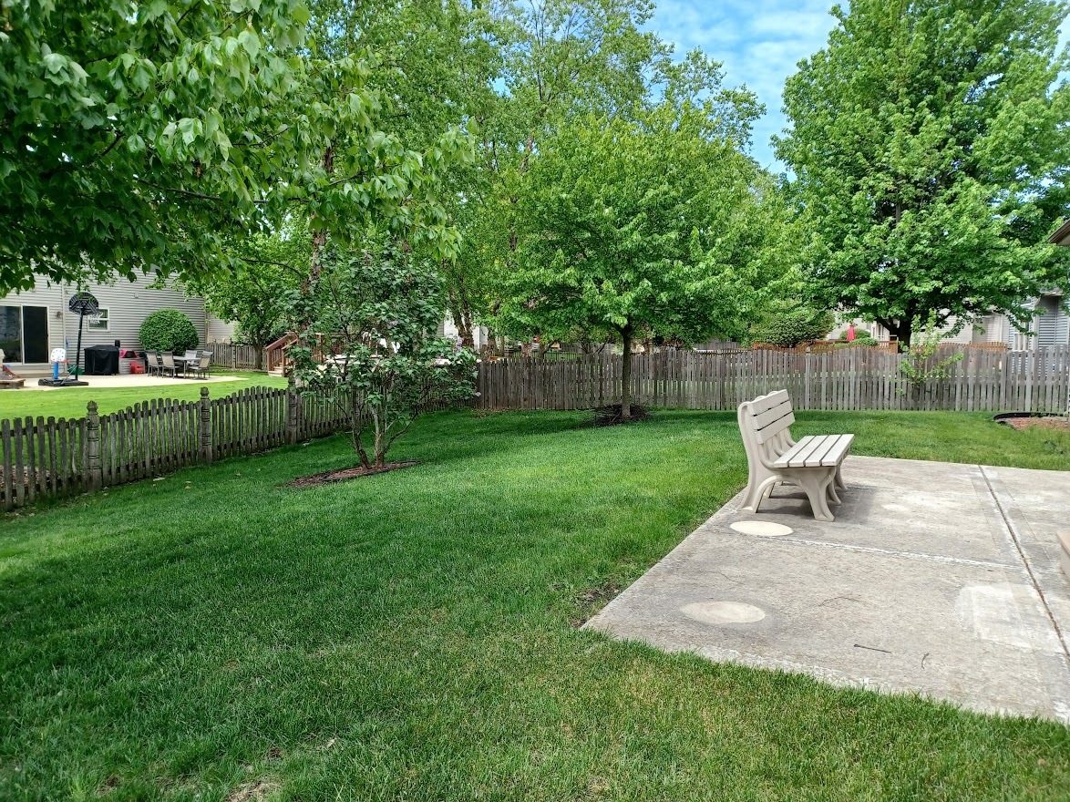 24463 Tufton Street Plainfield, IL 60585 - Photo 26 of 29 a garden with wooden fence