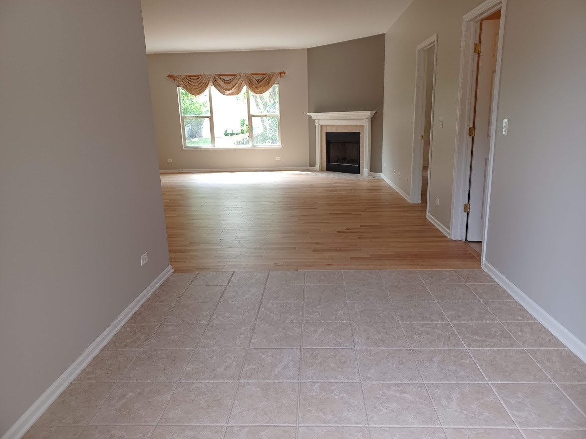 24463 Tufton Street Plainfield, IL 60585 - Photo 3 of 29 an empty room with windows