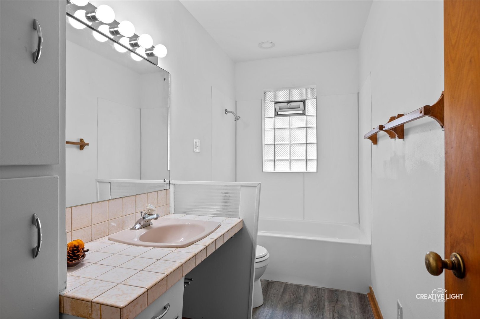 803 Alann Drive Joliet, IL 60435 - Photo 12 of 15 a bathroom with a sink double vanity granite tub shower and mirror