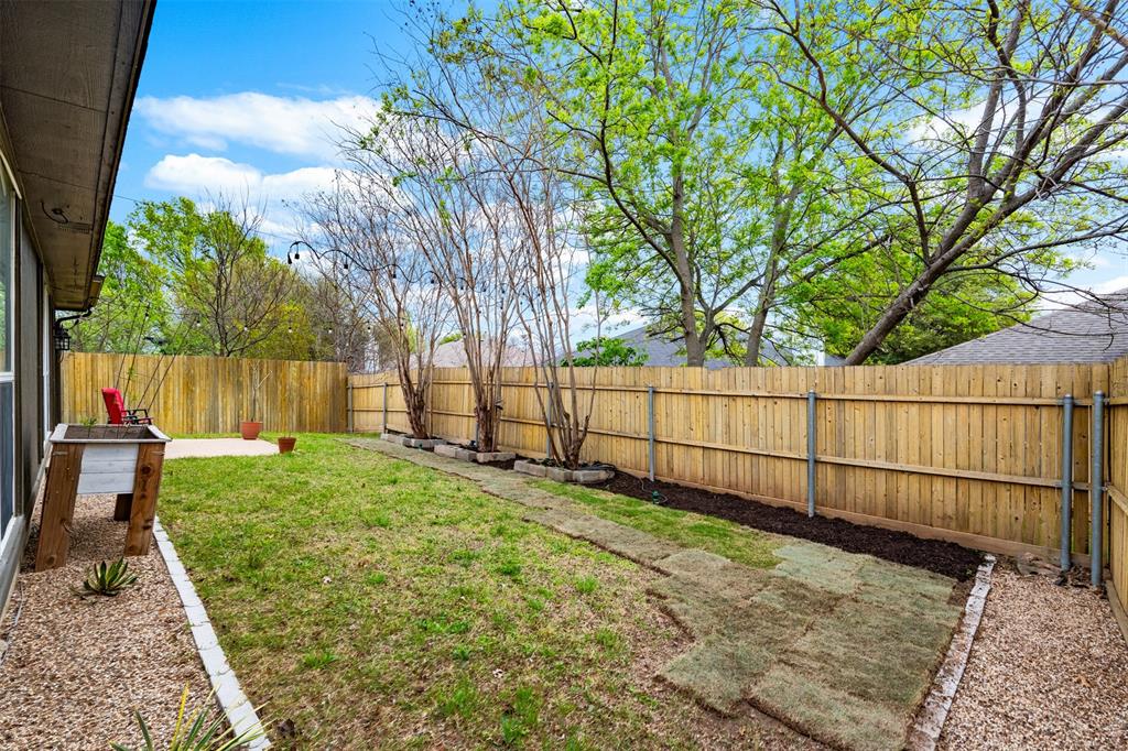 1011 Ridgecrest Drive McKinney, TX 75069 - Photo 28 of 31 Private backyard featuring a wooden privacy fence, a concrete patio, and a grass lawn