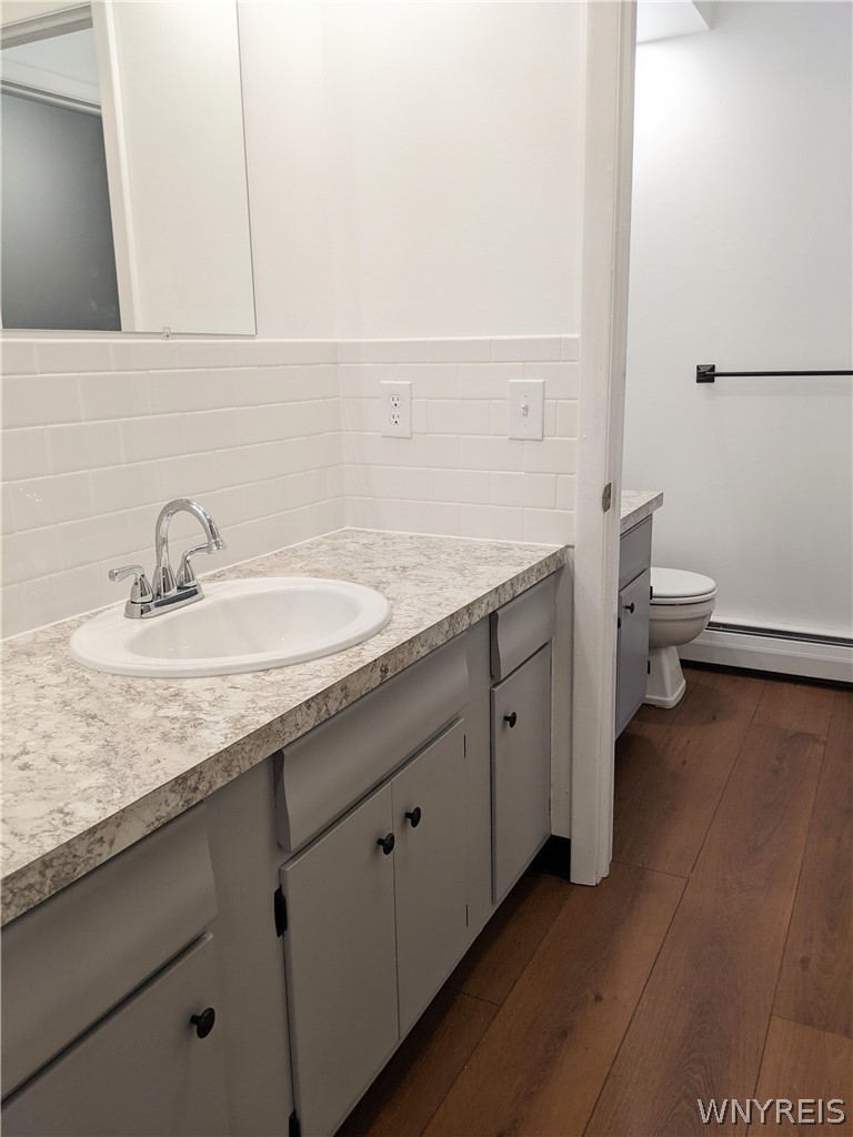 202 South Union Road, Unit 8 Amherst, NY 14221 - Photo 8 of 12 Jack & Jill tandem bathroom with double sinks