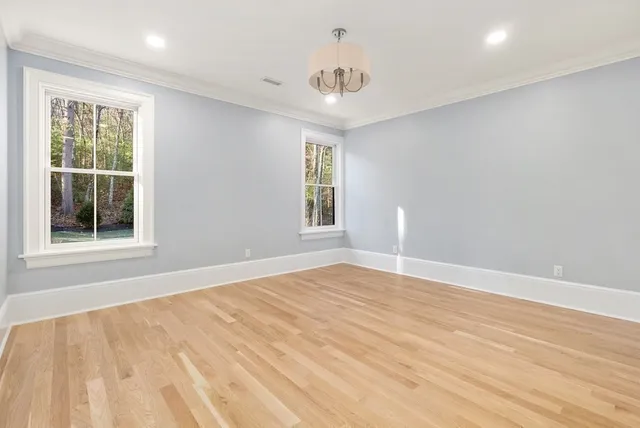 a bathroom with a granite countertop toilet a sink and a bathtub