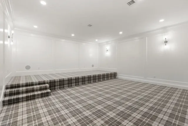 a view of an empty room with a closet