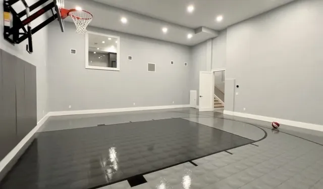 an empty room with wooden floor