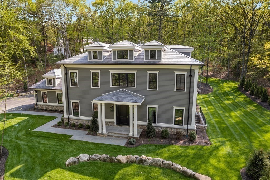 192 Pond Road Wellesley, MA 02482 - Photo 35 of 41 front view of a house with a yard