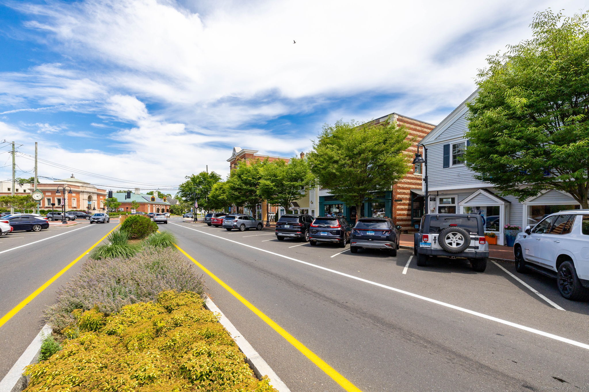 885 Boston Post Road Madison, CT 06443 - Photo 15 of 22 a view of street with parked cars