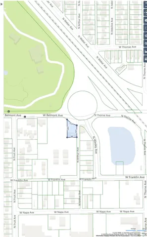 a bathroom with a bathtub and a large window