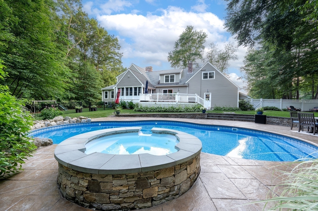 4 Dicarlo Road Hopkinton, MA 01748 - Photo 39 of 41 a view of swimming pool with outdoor seating and yard