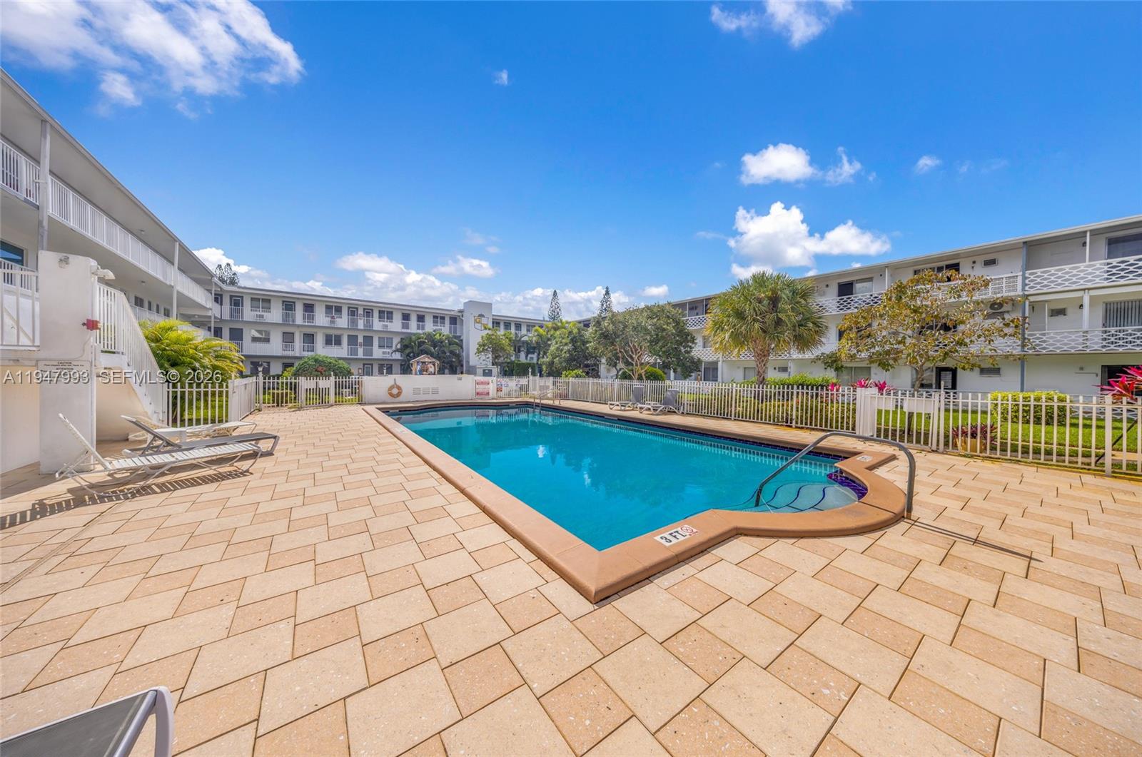 15610 Northeast 6th Avenue, Unit 9B Miami, FL 33162 - Photo 20 of 25 a view of swimming pool