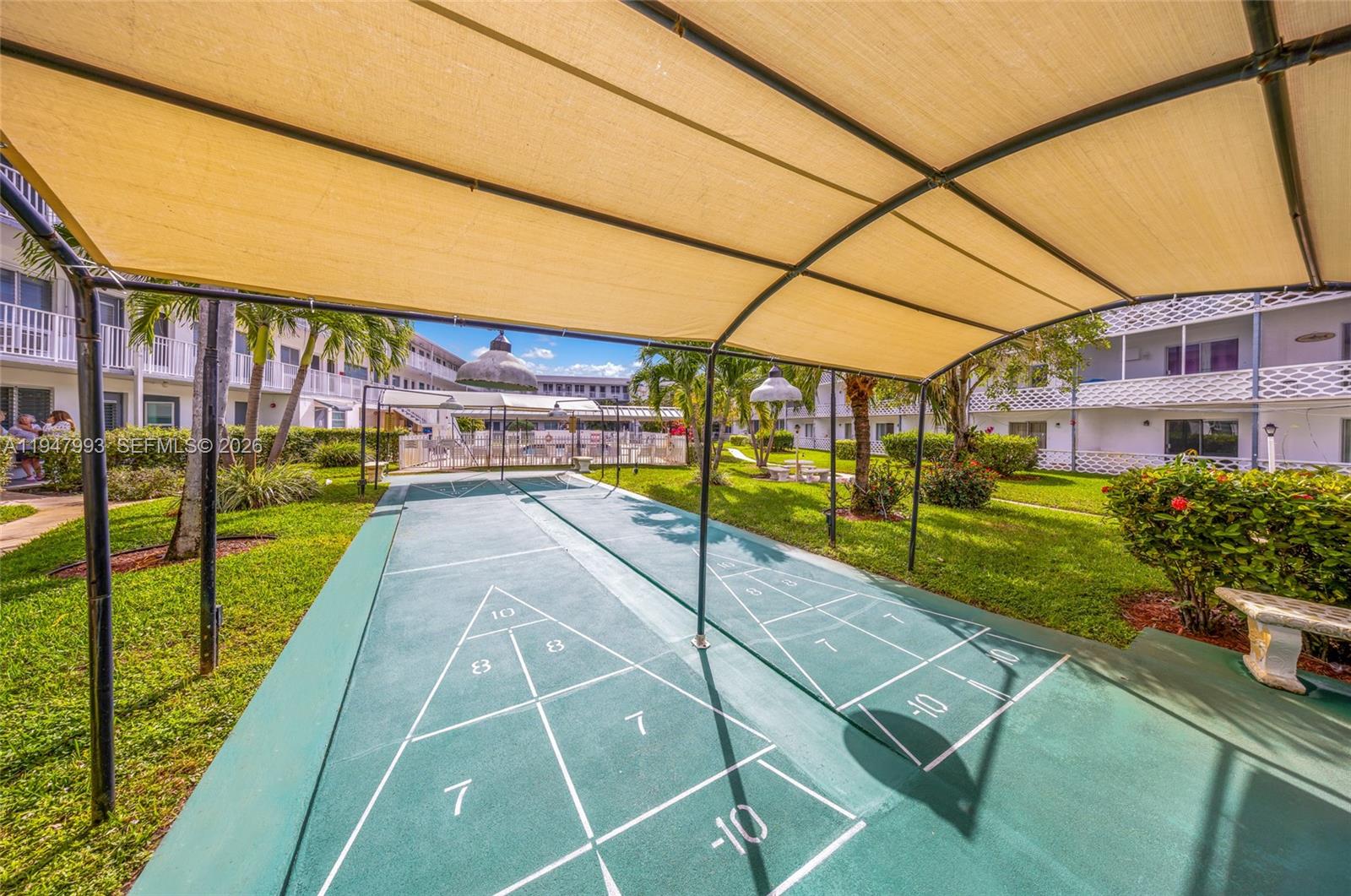 15610 Northeast 6th Avenue, Unit 9B Miami, FL 33162 - Photo 25 of 25 a view of swimming pool with a patio