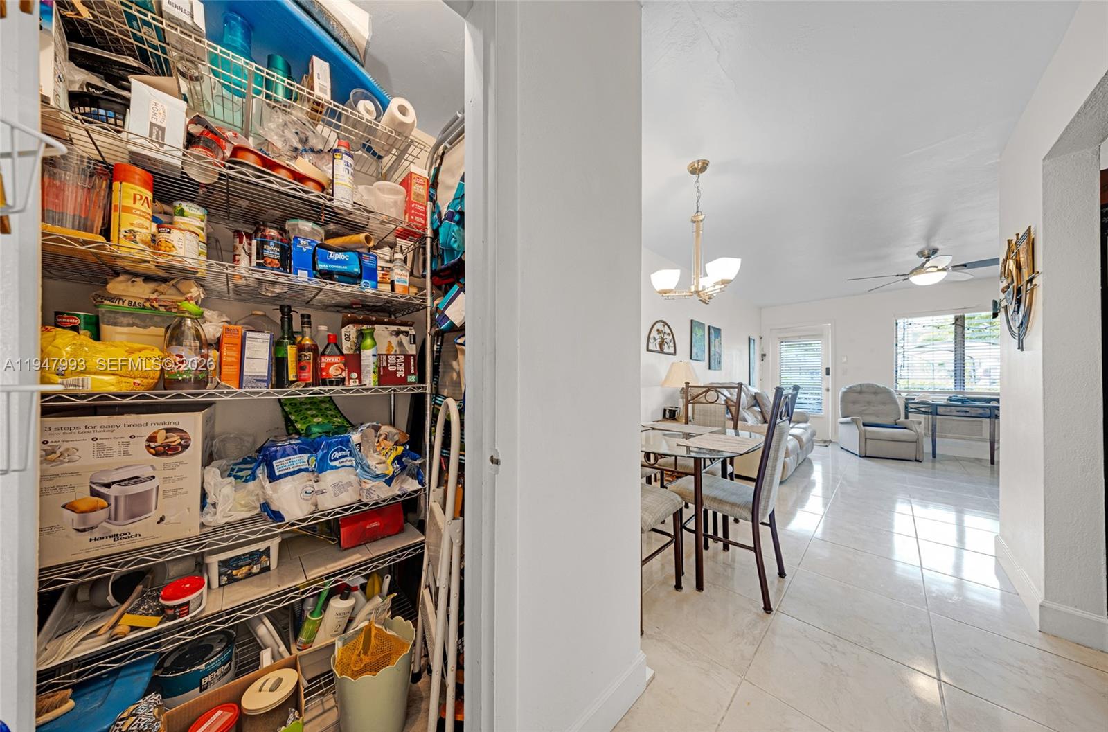 15610 Northeast 6th Avenue, Unit 9B Miami, FL 33162 - Photo 9 of 25 a view of a room with gym equipment