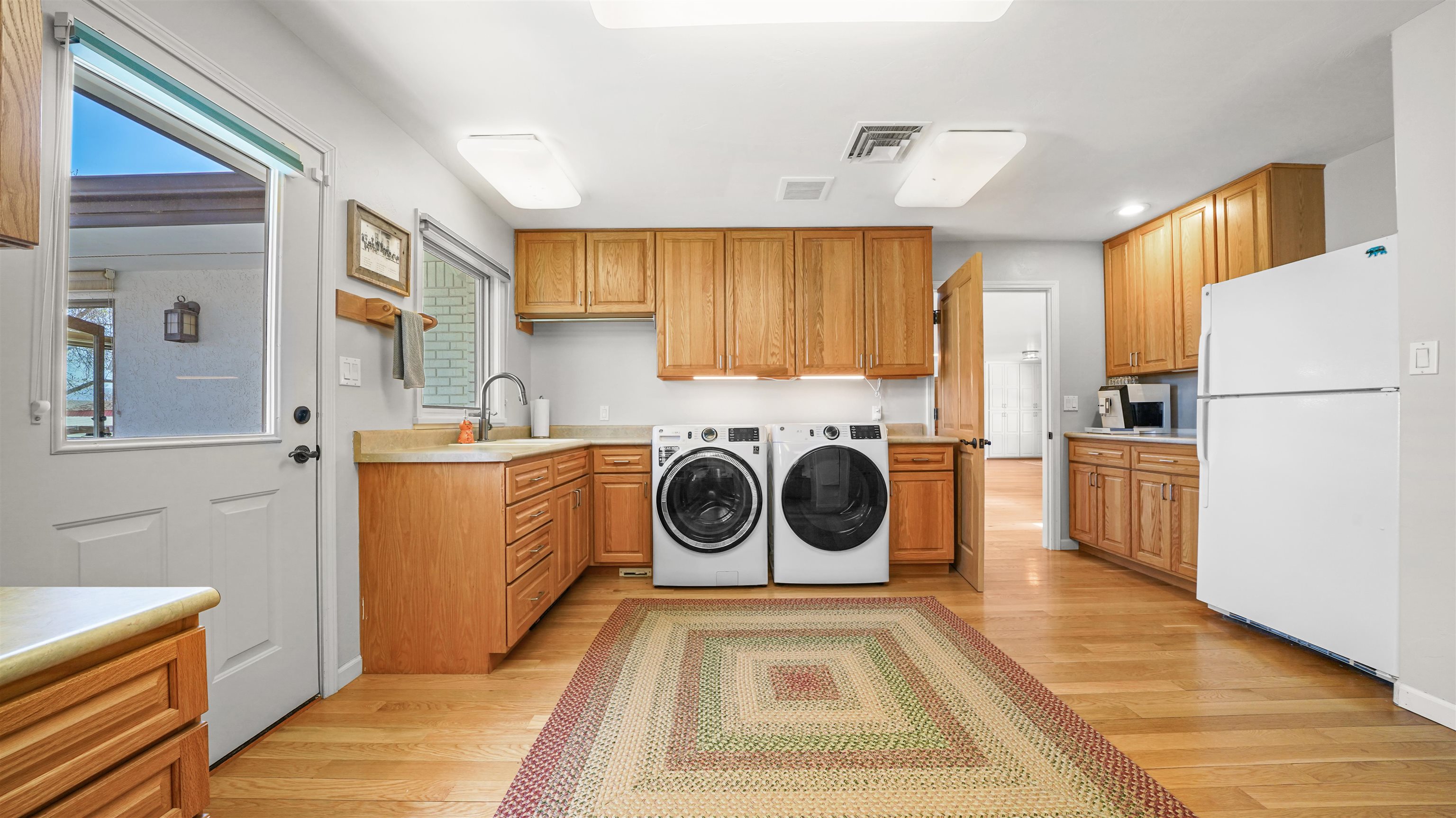 3339 C Road Palisade, CO 81526 - Photo 14 of 39 a utility room with sink a washer and dryer