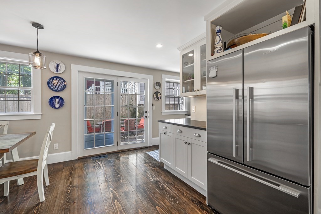 3 State Street Marblehead, MA 01945 - Photo 5 of 33 a kitchen with refrigerator and wooden floor