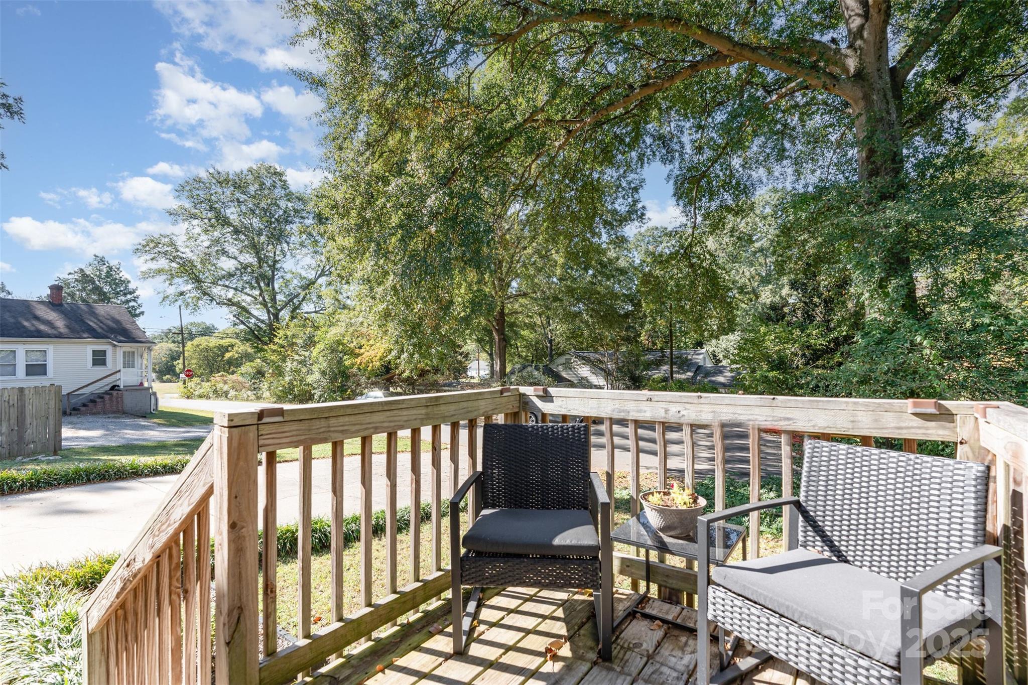 809 Fargo Drive Southwest Concord, NC 28027 - Photo 19 of 24 a view of balcony with wooden floor and outdoor seating