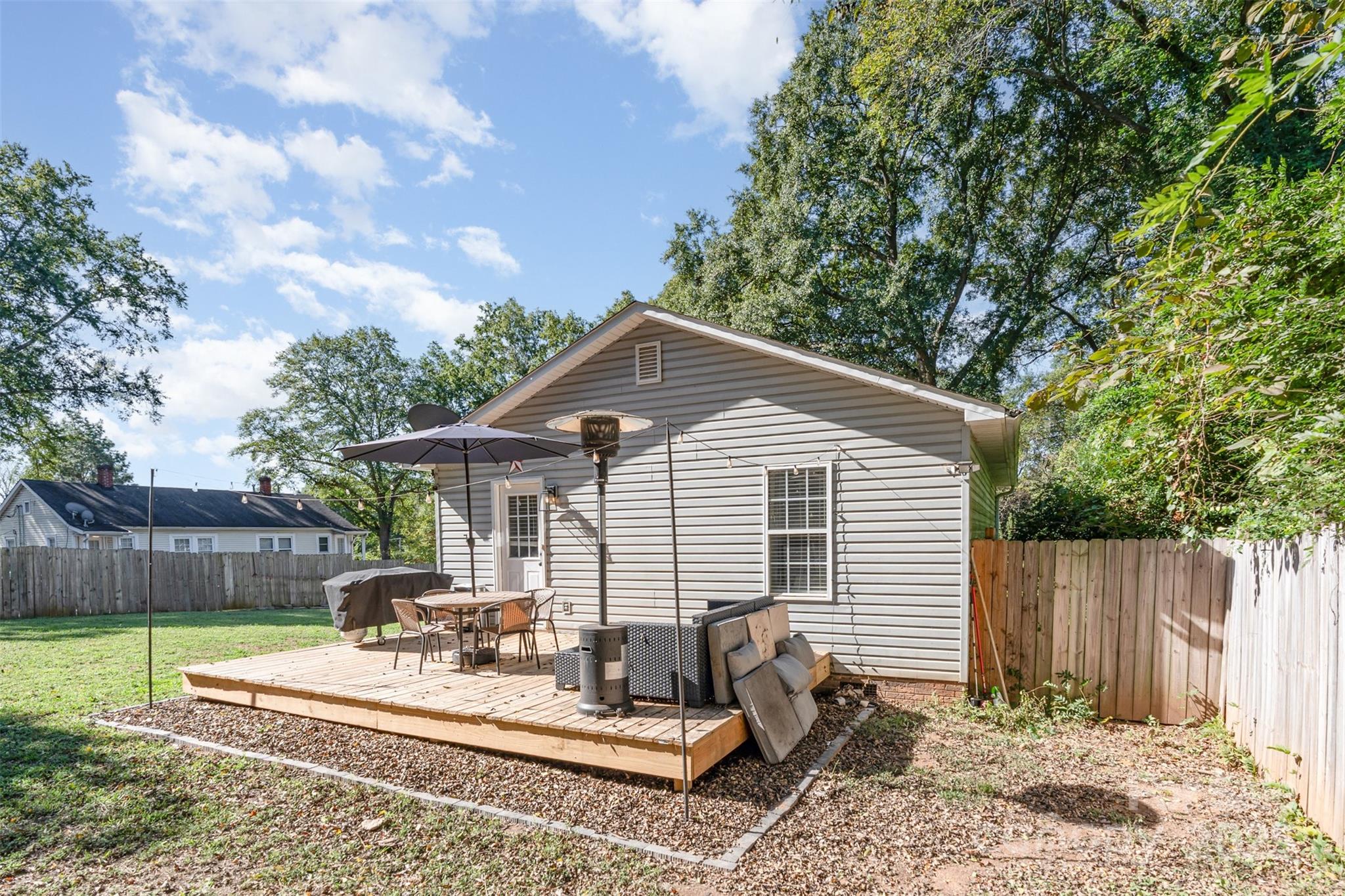 809 Fargo Drive Southwest Concord, NC 28027 - Photo 23 of 24 a view of a house with a yard and furniture