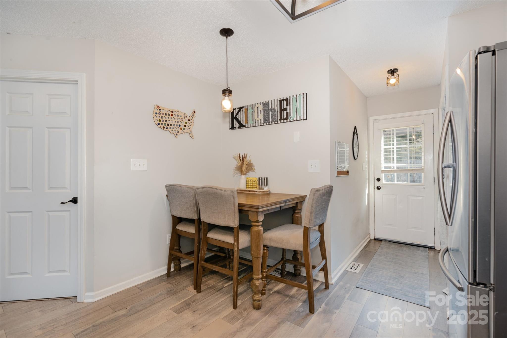 809 Fargo Drive Southwest Concord, NC 28027 - Photo 7 of 24 a view of a dining room with furniture