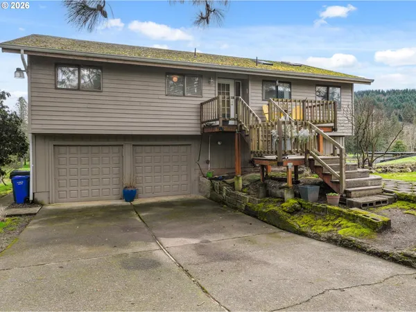 a front view of a house with a garage