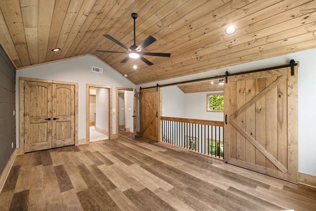 78 Pocola Court Ellijay, GA 30540 - Photo 20 of 47 a view of a livingroom with a ceiling fan and window