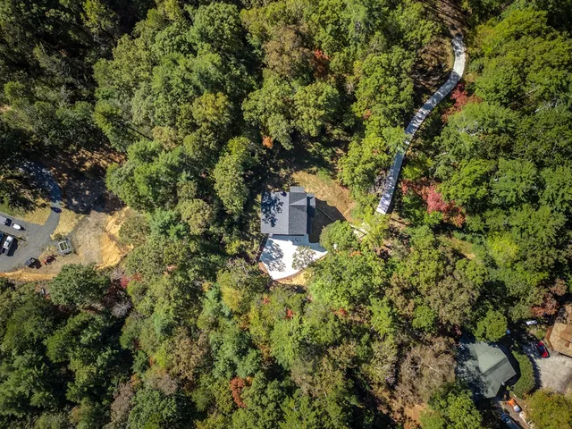 a house view with a backyard space